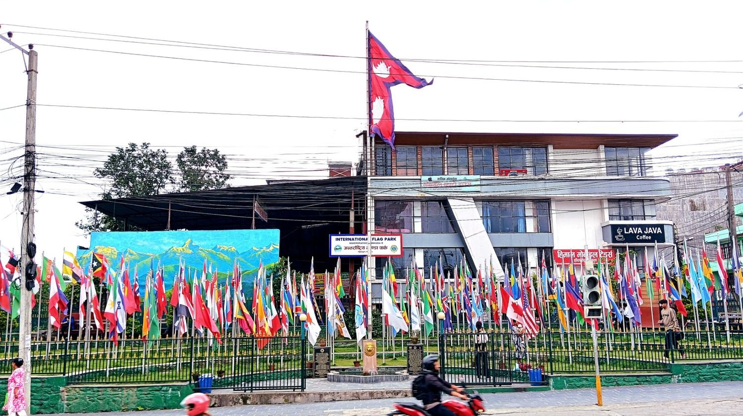 International Flag Park at Mahendrapul Pokhara featuring the national flag of Nepal and flags of UN member nations