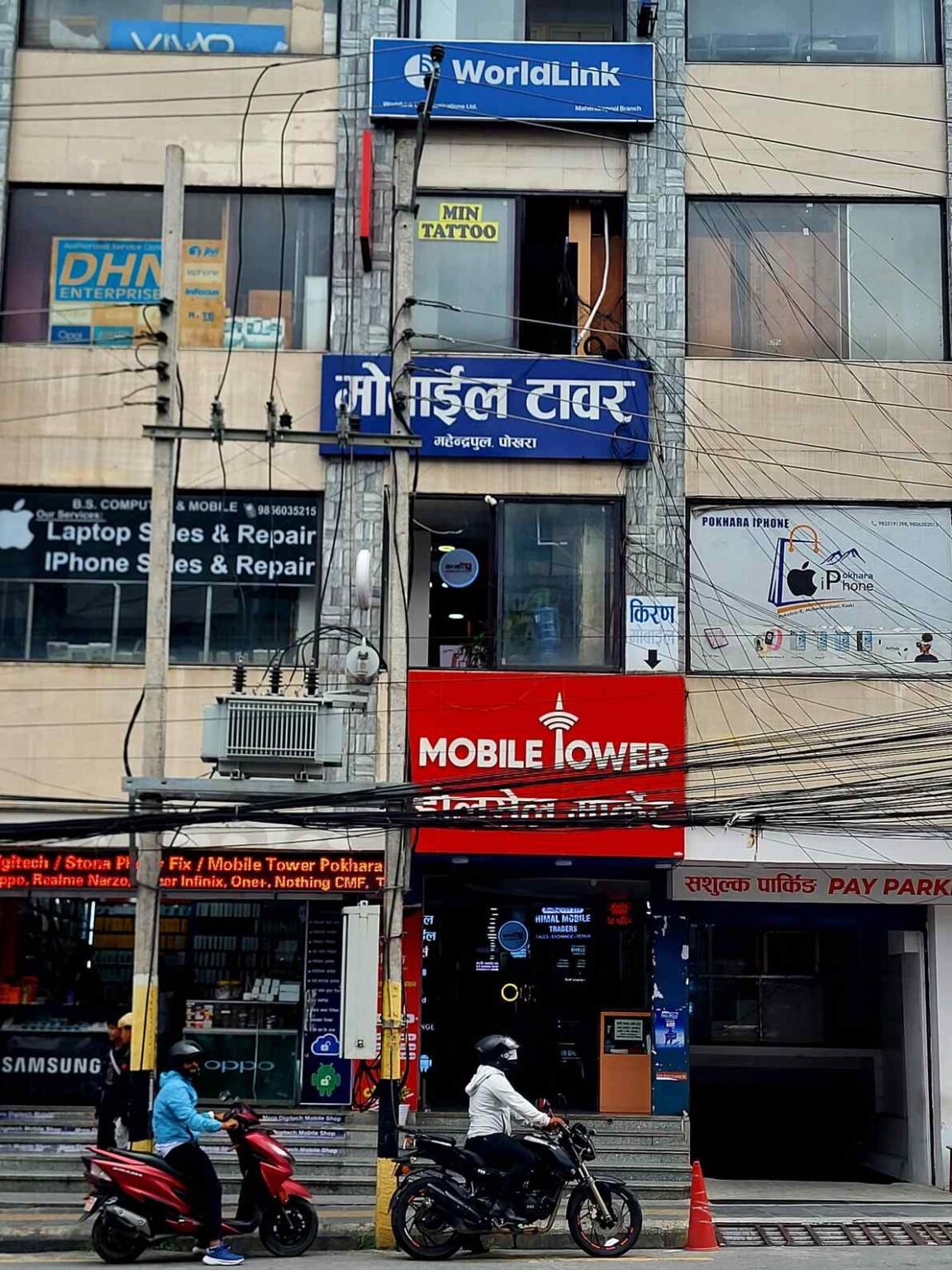 Full Vertical View of Pokhara Mobile Tower with WorldLink and Mobile Tower signs